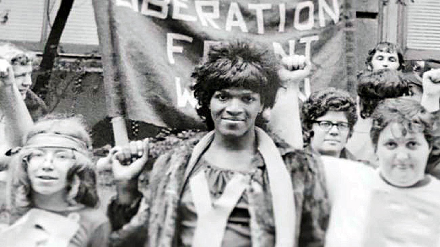 black and white photo of marsha p johnson smiling